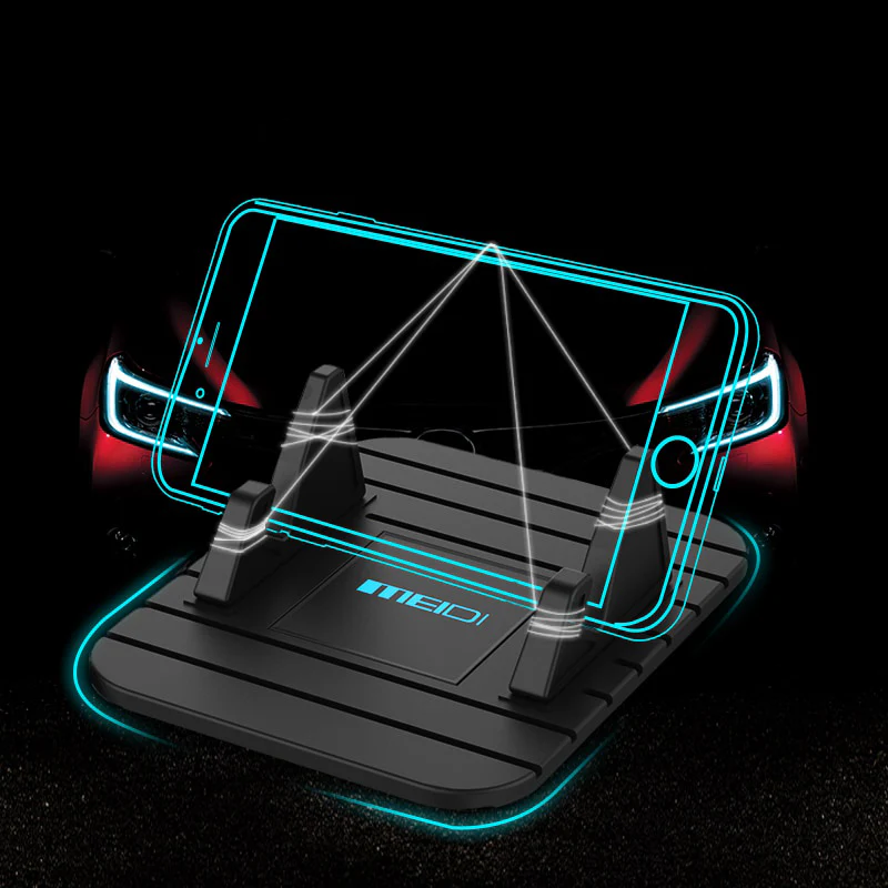 Universal non-slip phone holder for car dashboard or home desktop stand. Silicone mobile accessory.