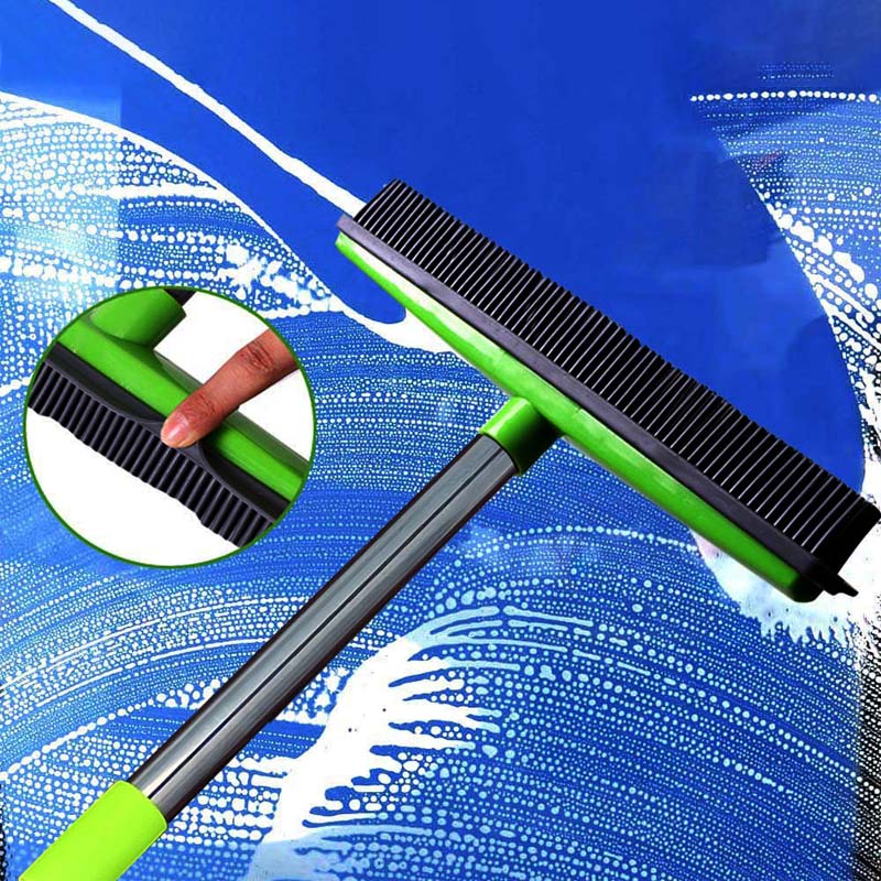 Pet hair remover broom in action on a carpet, demonstrating efficient pet fur and lint pick-up