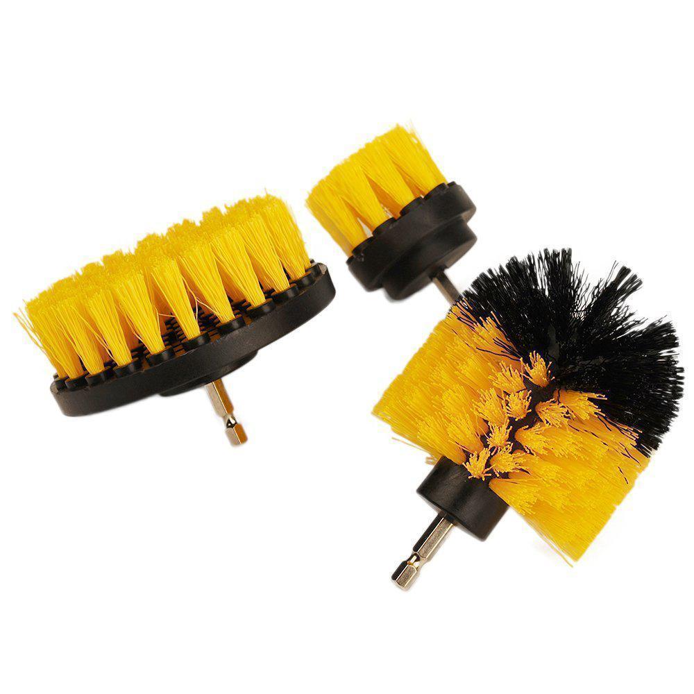 Hand holding a drill with a power scrubber attachment, ready to clean a dirty shower wall.