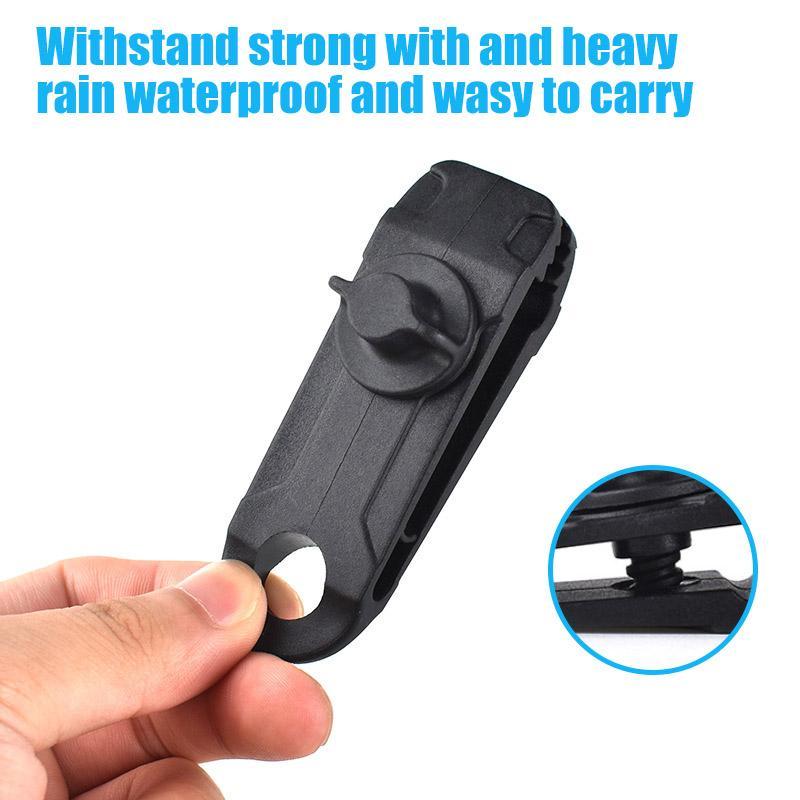 Versatile red tarp clip, an outdoor equipment essential for securing tents & emergency shelters.