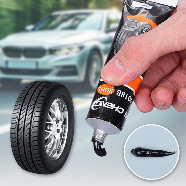 Close-up of Universal Tire Repair Adhesive tube with applicator, ideal for automotive puncture repair, car care