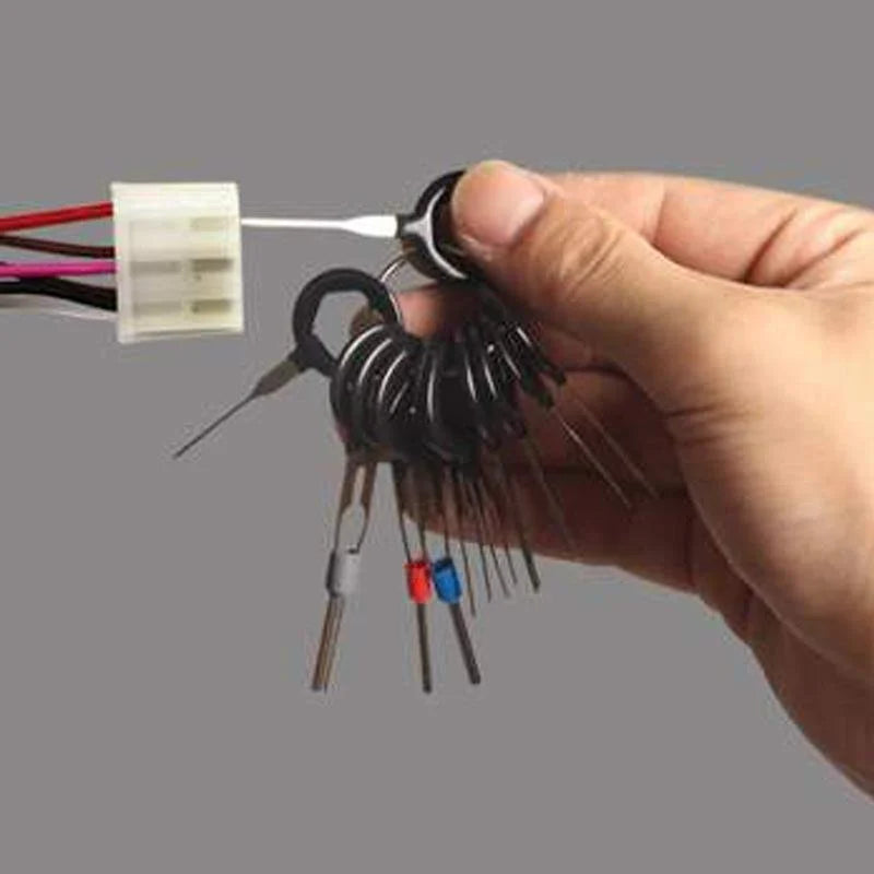 Detailed view of a pin extractor from the universal wire terminal removal kit, for electrical work