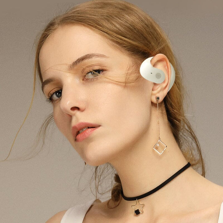 Close-up of the microphone on a Universal wireless Bluetooth earbud for clear calls