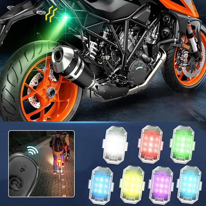 LED strobe light affixed to a backpack, functioning as a safety light for hikers and outdoor enthusiasts.