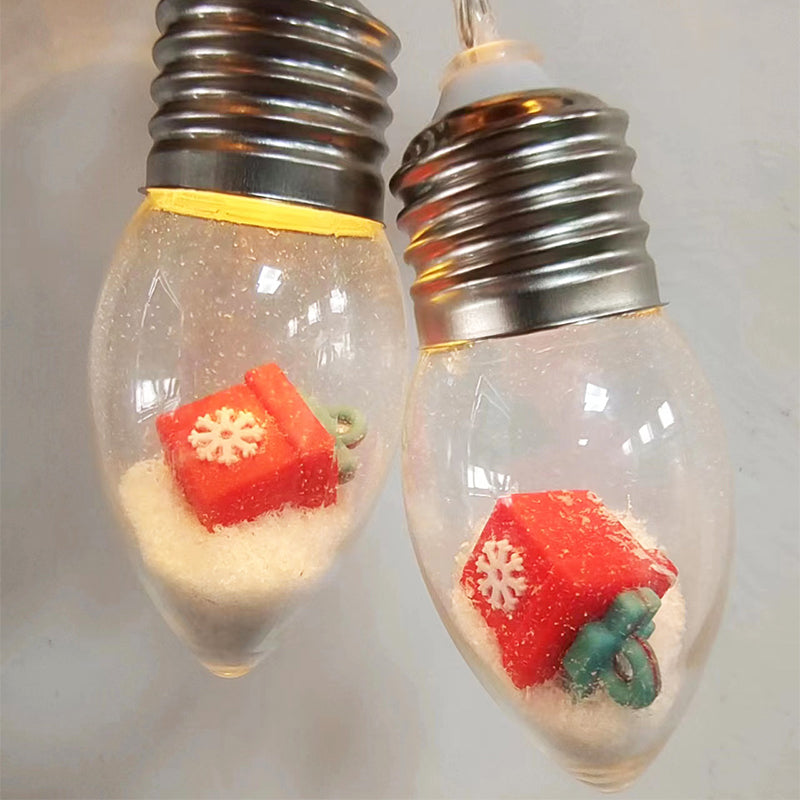 Reflection of USB-powered Santa and snowman LED lights on a polished surface, party decor