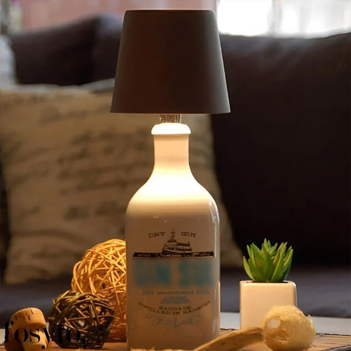 Close-up of the USB charging port on a sleek cordless bottle lamp design