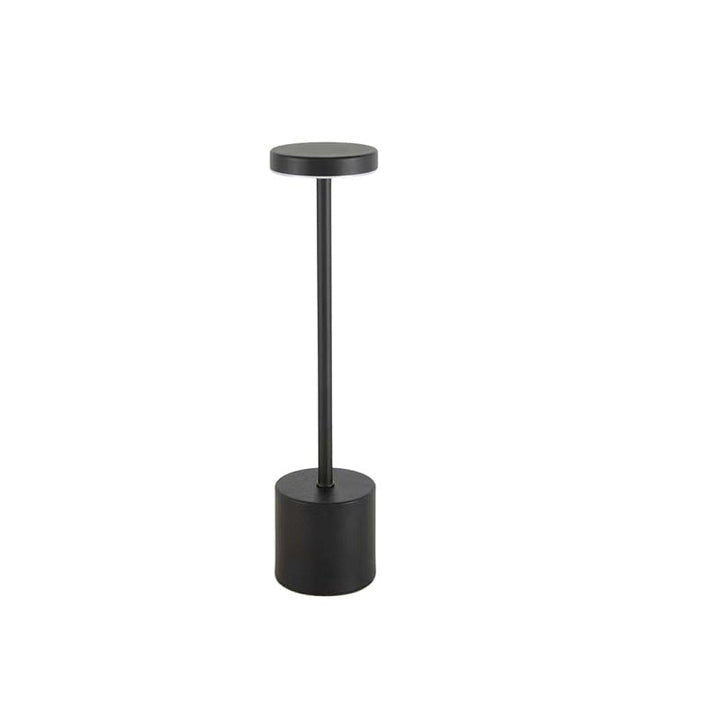 Weather-resistant portable LED table lamp on a balcony, perfect for outdoor use