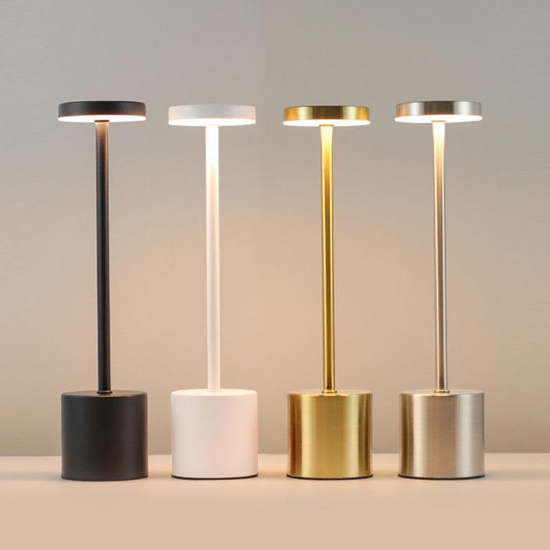 Stylish cordless LED table lamp casting warm ambient light, perfect for modern home decor