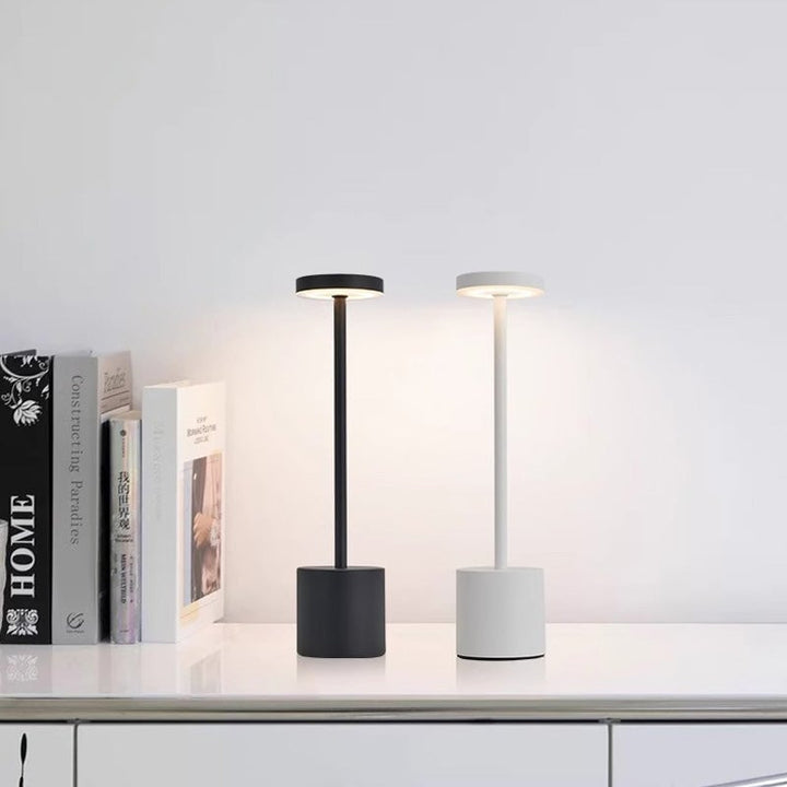 Detail of the matte finish and touch-sensitive base of the portable LED table lamp