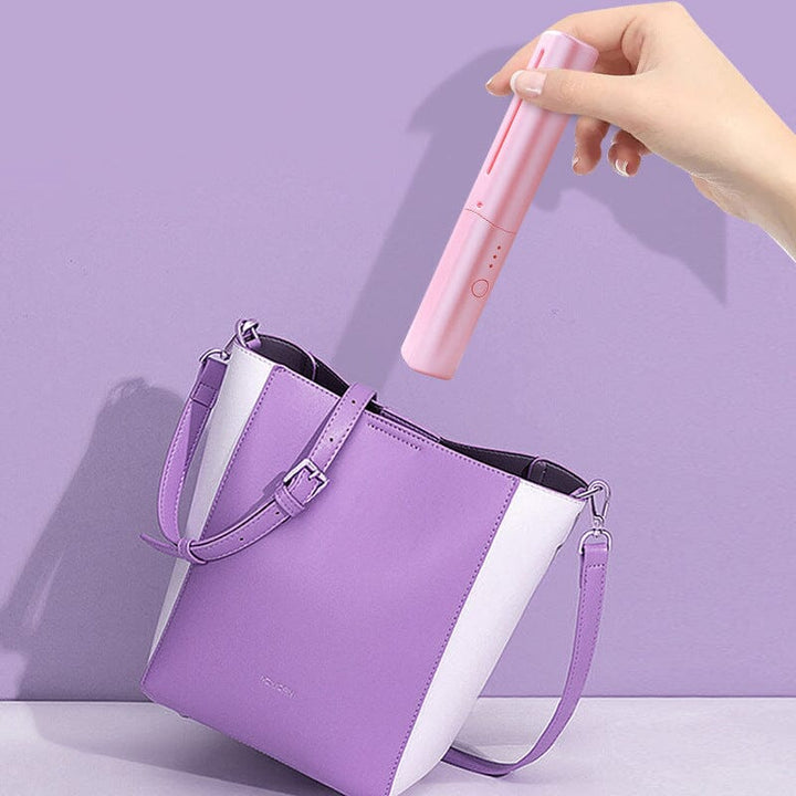 Mini hair straightening brush with USB charging, perfect for compact, travel-friendly hair styling. Beauty tool.