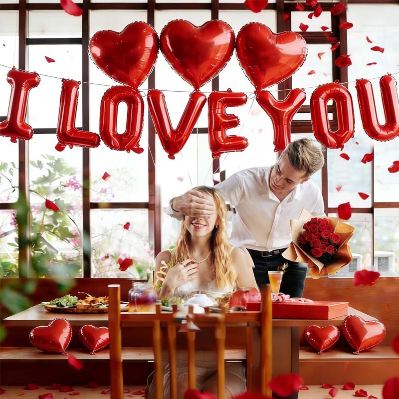 Arrangement of assorted red and pink balloons for a romantic Valentine's party
