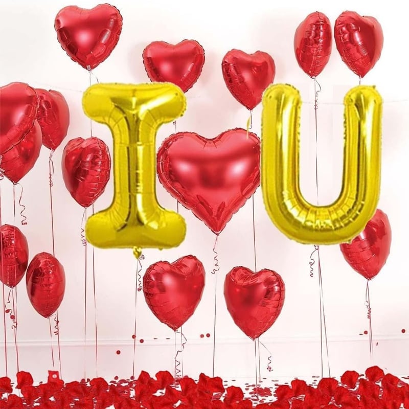 Romantic indoor setting decorated with Valentine's themed balloons for loved ones