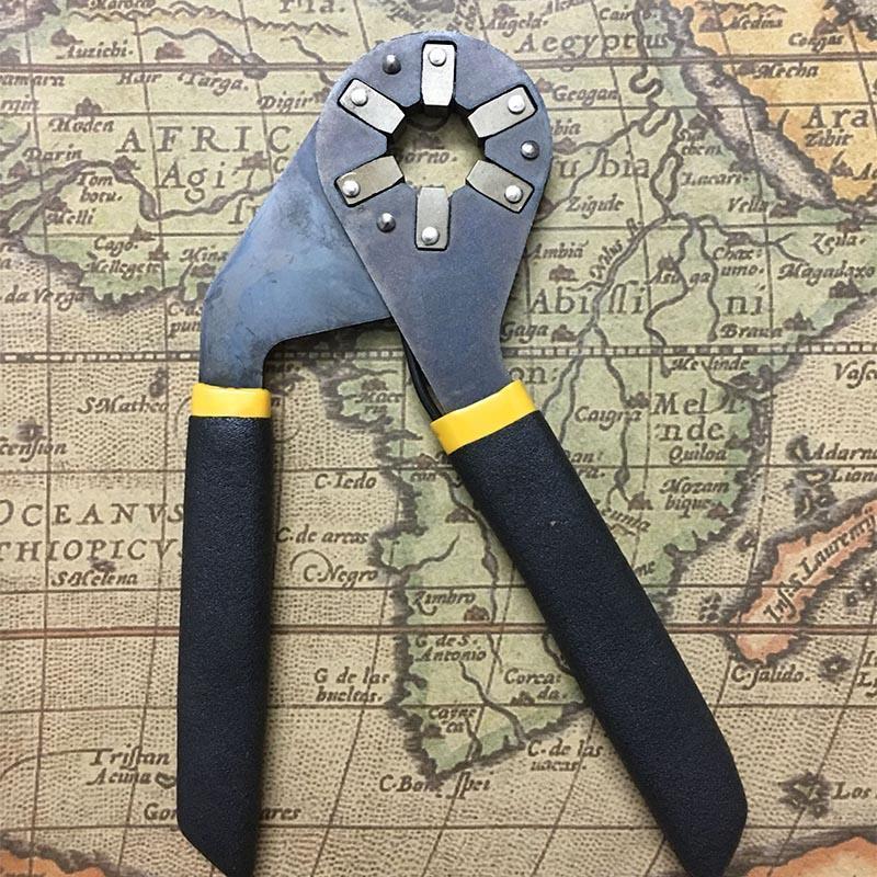 Adjustable wrench alongside other hand tools, highlighting its versatility
