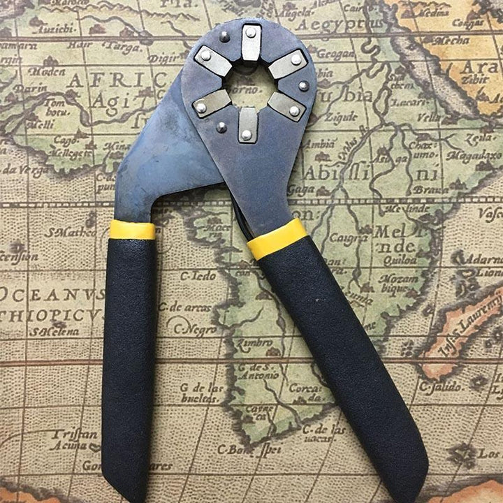 Adjustable wrench alongside other hand tools, highlighting its versatility