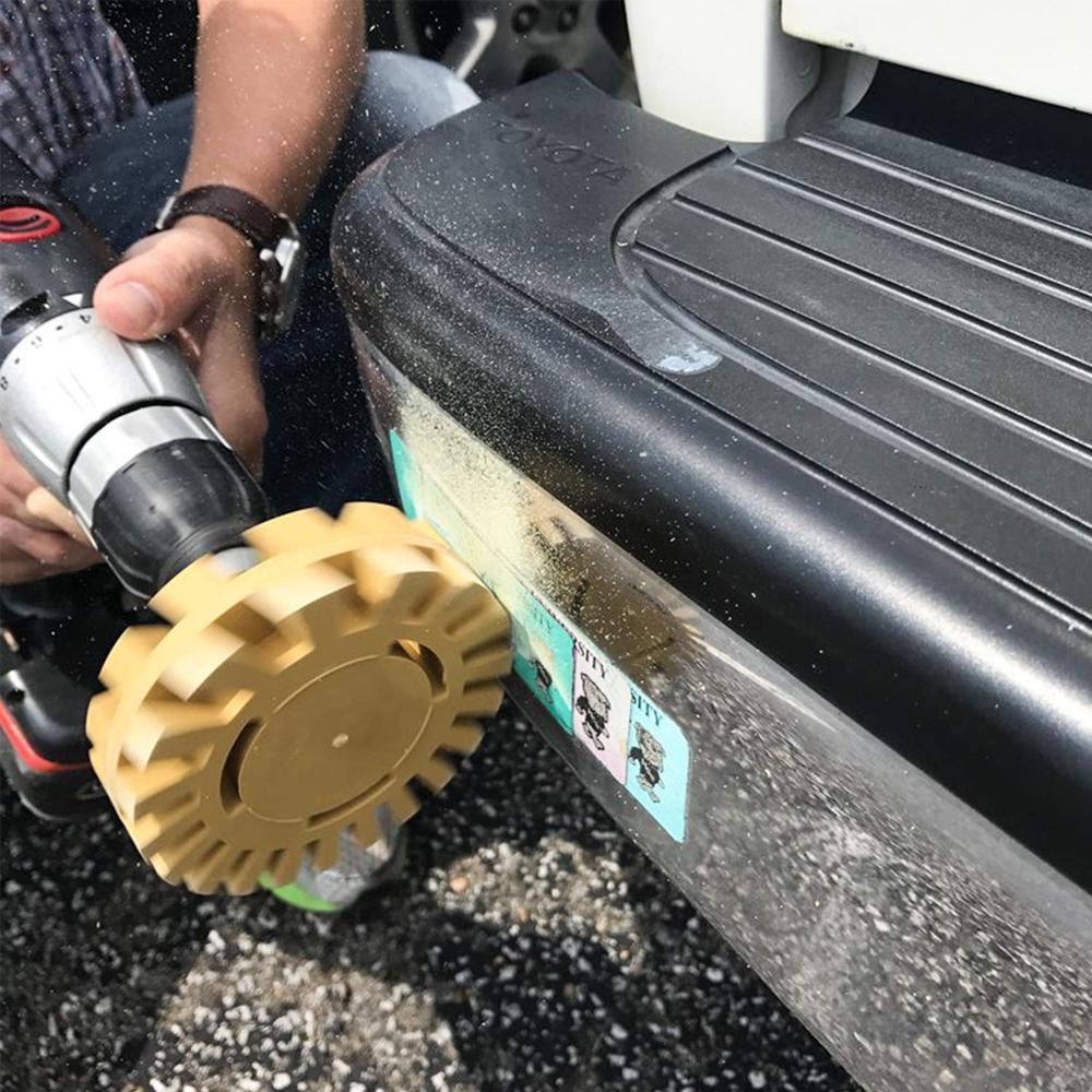 Pinstripe removal wheel in action, demonstrating clean and safe adhesive elimination