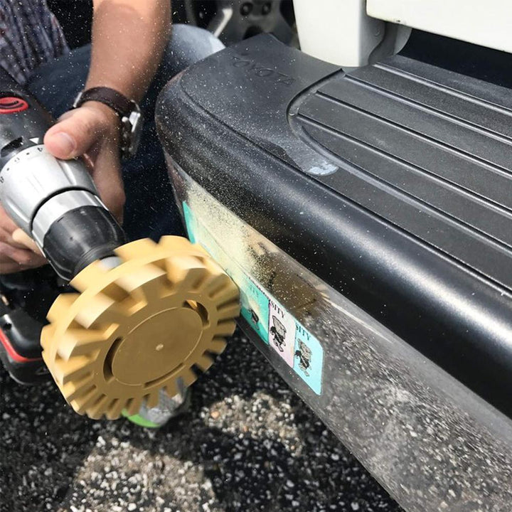 Pinstripe removal wheel in action, demonstrating clean and safe adhesive elimination