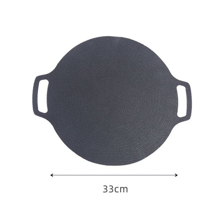 Set of kitchenware including the non-stick round grill pan, a must-have cooking tool