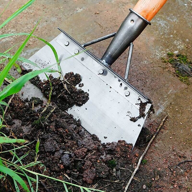 Stainless steel scraper shovel for patio, path & garden cleaning tasks.