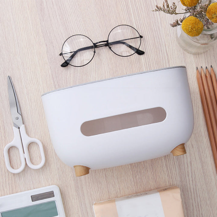 Compact home organization unit: a sleek tissue box combined with a handy storage caddy.