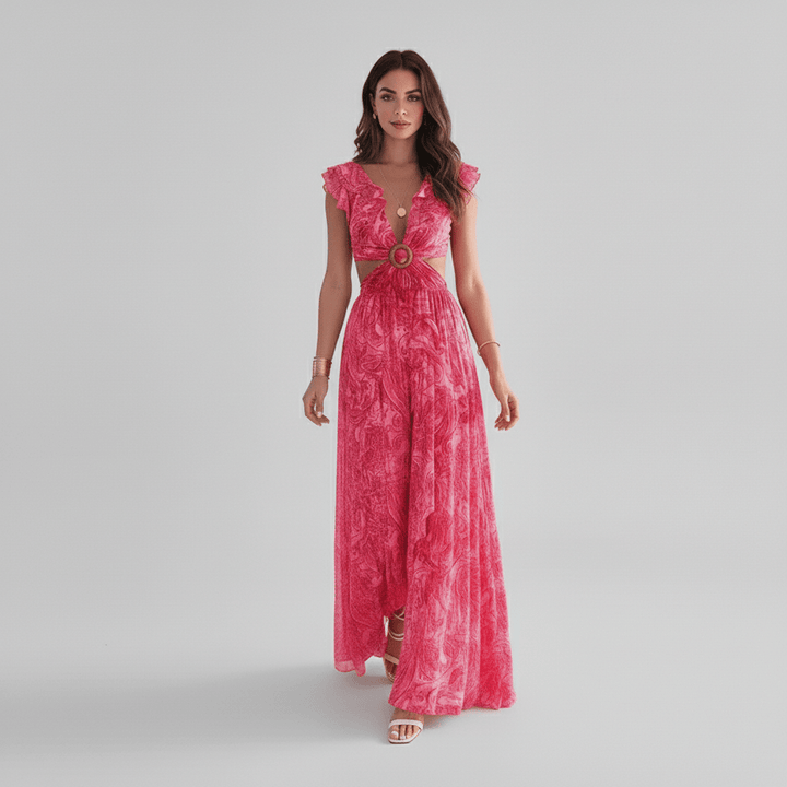 Vibrant abstract print maxi dress for women, featuring a chic cut-out design & elegant ruffle sleeves, perfect for wedding guests.