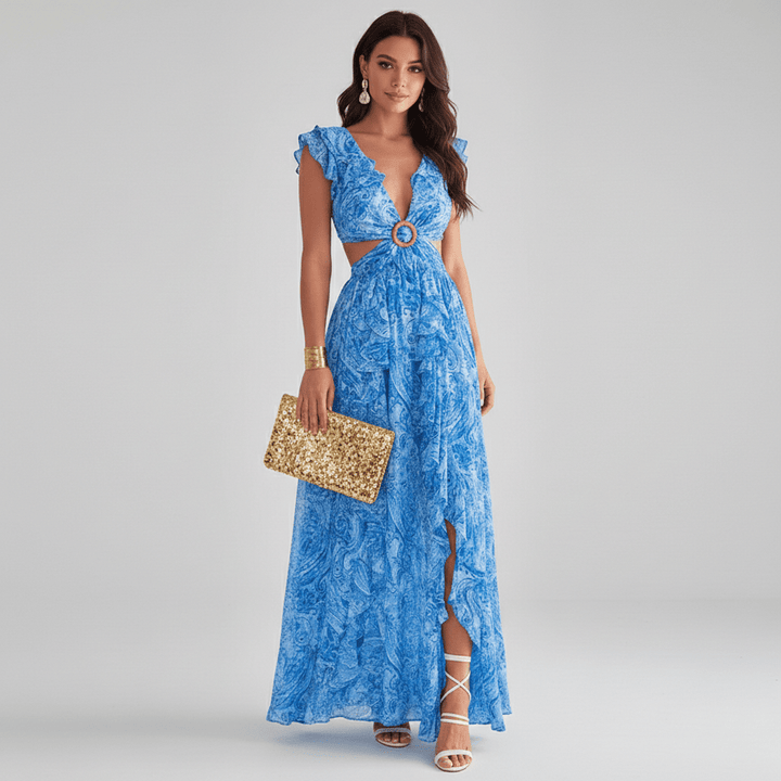 Women's vibrant abstract print maxi dress, showcasing a trendy cut-out design & delicate ruffle sleeves for an elegant look.