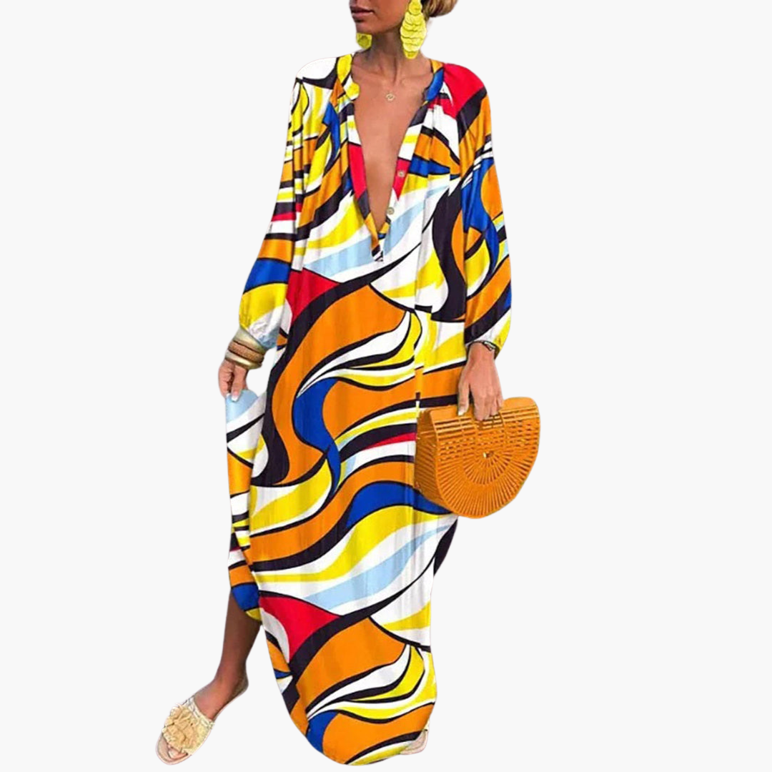 Women's vibrant abstract print V-neck oversized maxi dress, elegant for beach, resort or summer outings.
