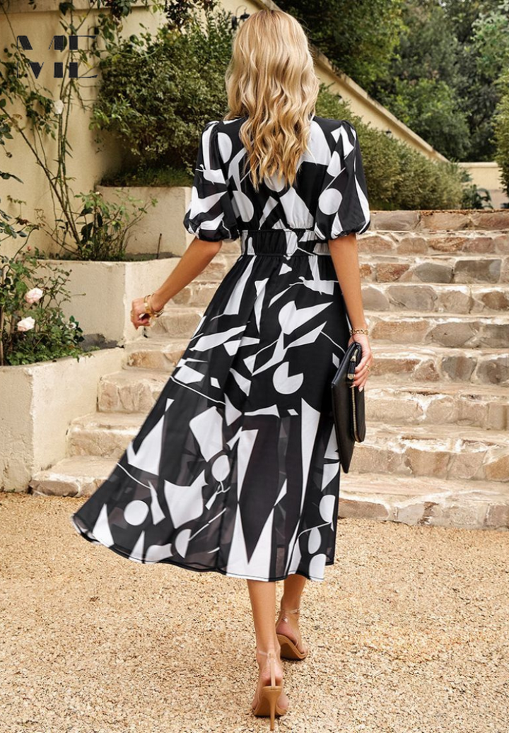 Stylish women's floral A-line midi dress, a versatile short sleeve piece for urban summer elegance.