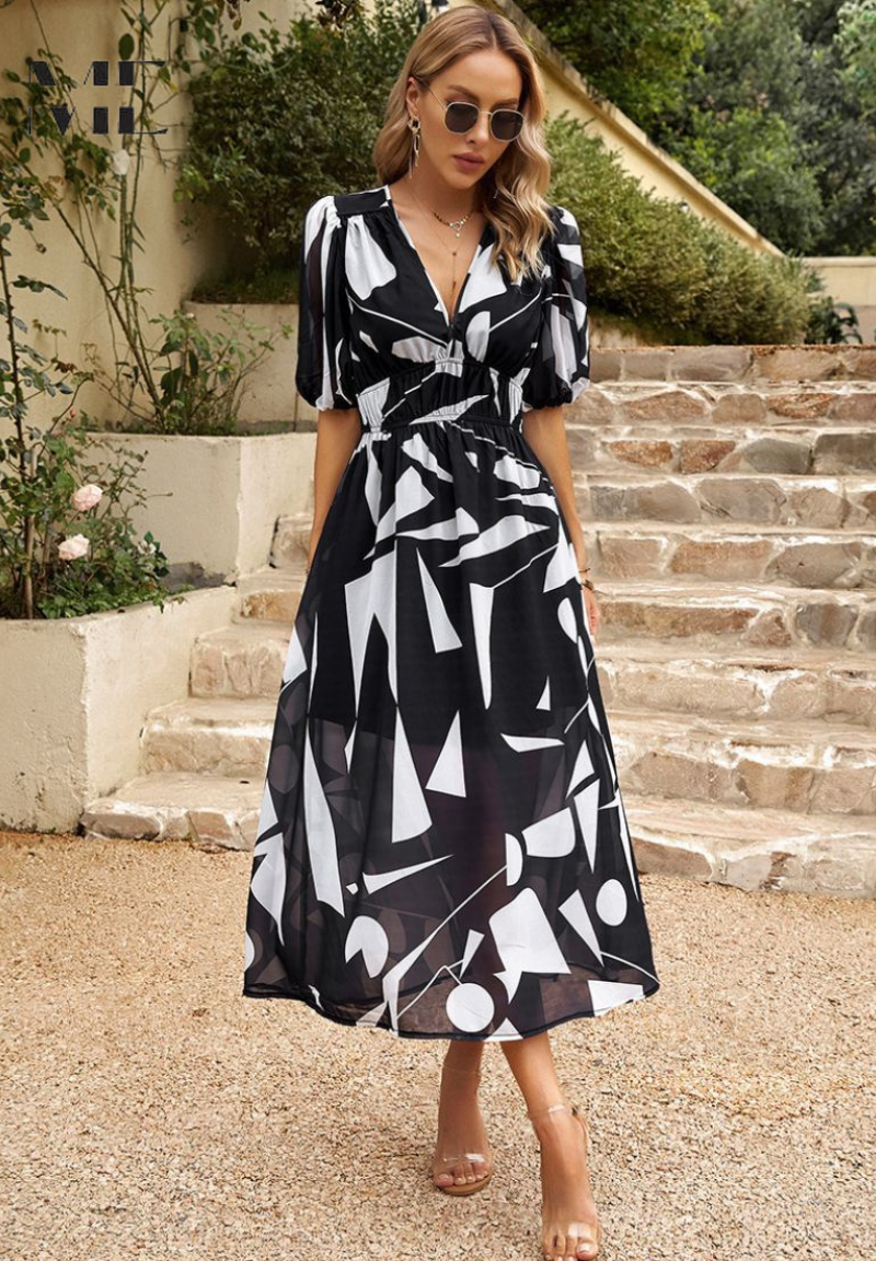 Feminine floral A-line midi dress for women, a short sleeve event dress styled for elegant occasions.