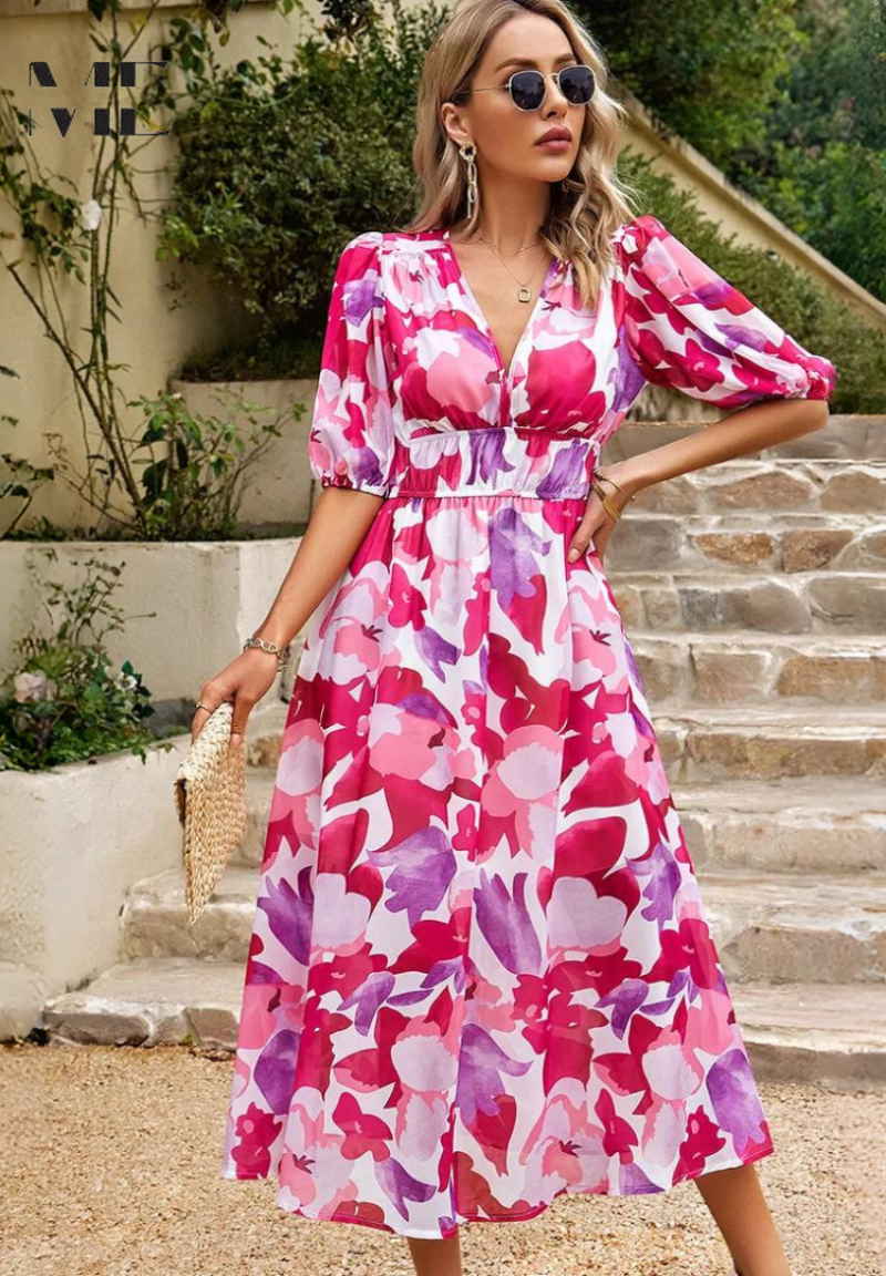 Vivid floral print on a women's A-line midi dress, a short sleeve design perfect for stylish summer looks.