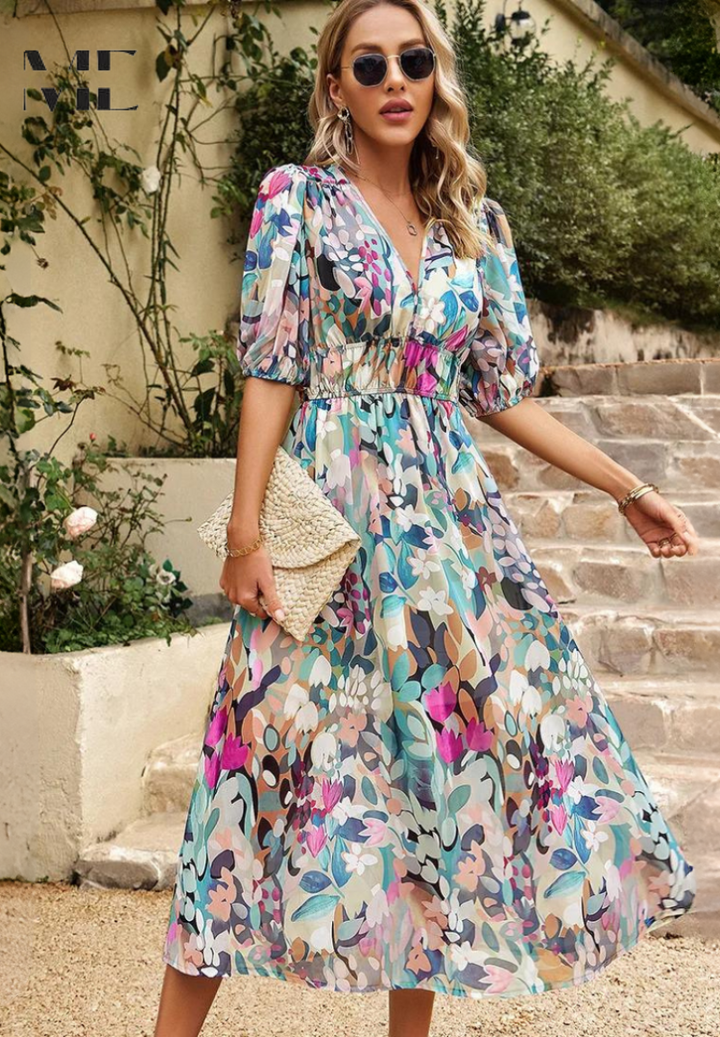 Chic women's floral midi dress with A-line silhouette, short sleeves, and elegant back detail.