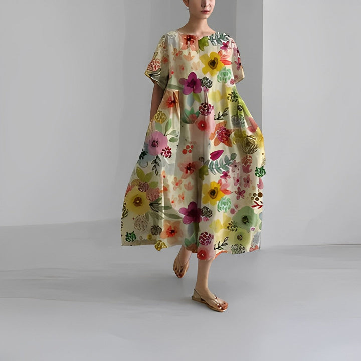 Stylish women's vibrant floral dress, a flowy maxi design for effortless spring fashion.