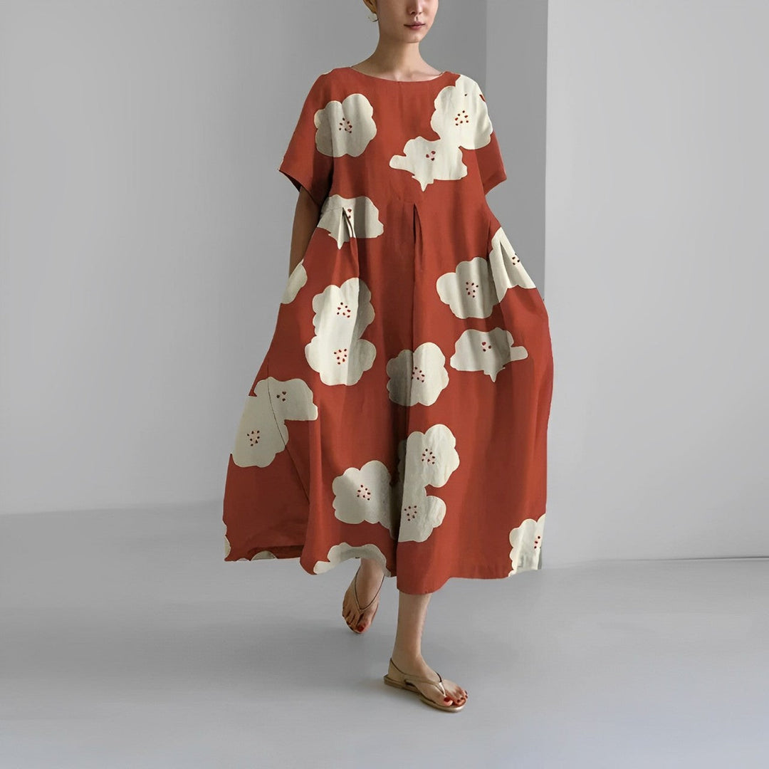 Women's long floral dress with a vibrant pattern, perfect for casual elegance and summer days.