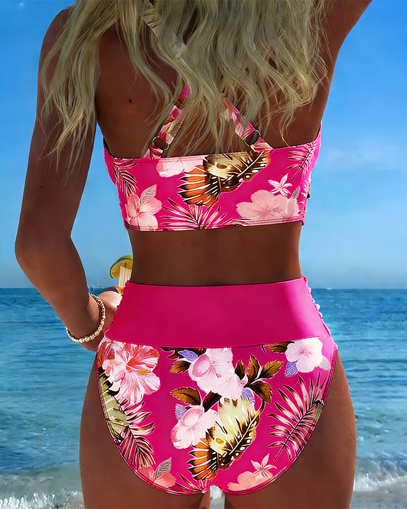 Women's vibrant floral split bikini, a stylish choice for summer swim and beach activities.