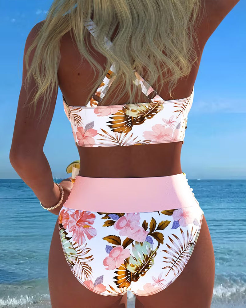 Women's two-piece floral bikini, ideal for summer beachwear and vacation poolside style.