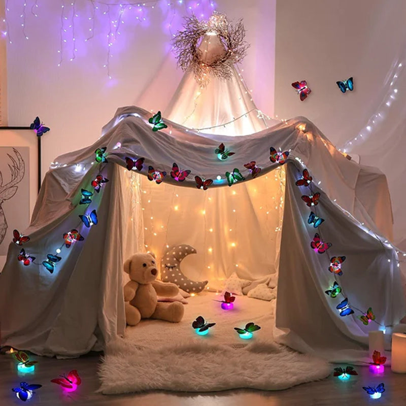 Pack of 36 LED butterfly wall decor elements, creating a magical glow in any room or event space