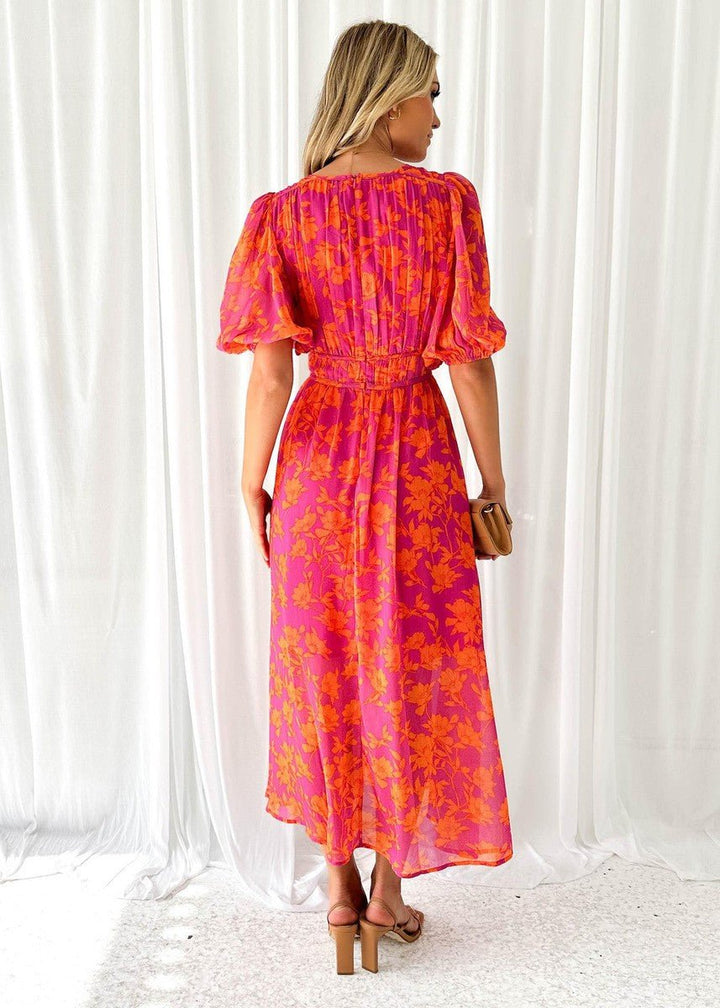 Elegant women's pink orange floral maxi dress, V-neck, flutter sleeves. A beautiful, casual-yet-chic brunch outfit.