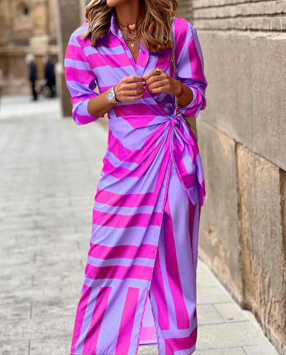 Women's vibrant printed wrap dress, transitions seamlessly from casual daywear to chic evening elegance.