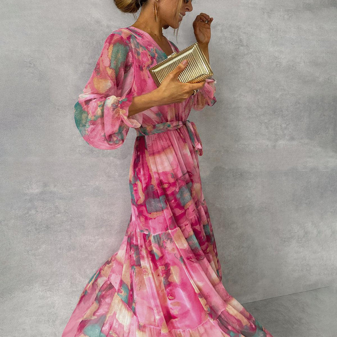 Rose red vibrant floral maxi wrap dress for women, featuring a flattering v-neck and charming ruffle sleeves.
