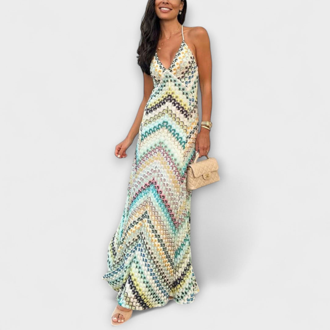 Comfortable women's ankle length V-neck maxi dress. Vibrant, stylish, and long, suitable for various occasions.