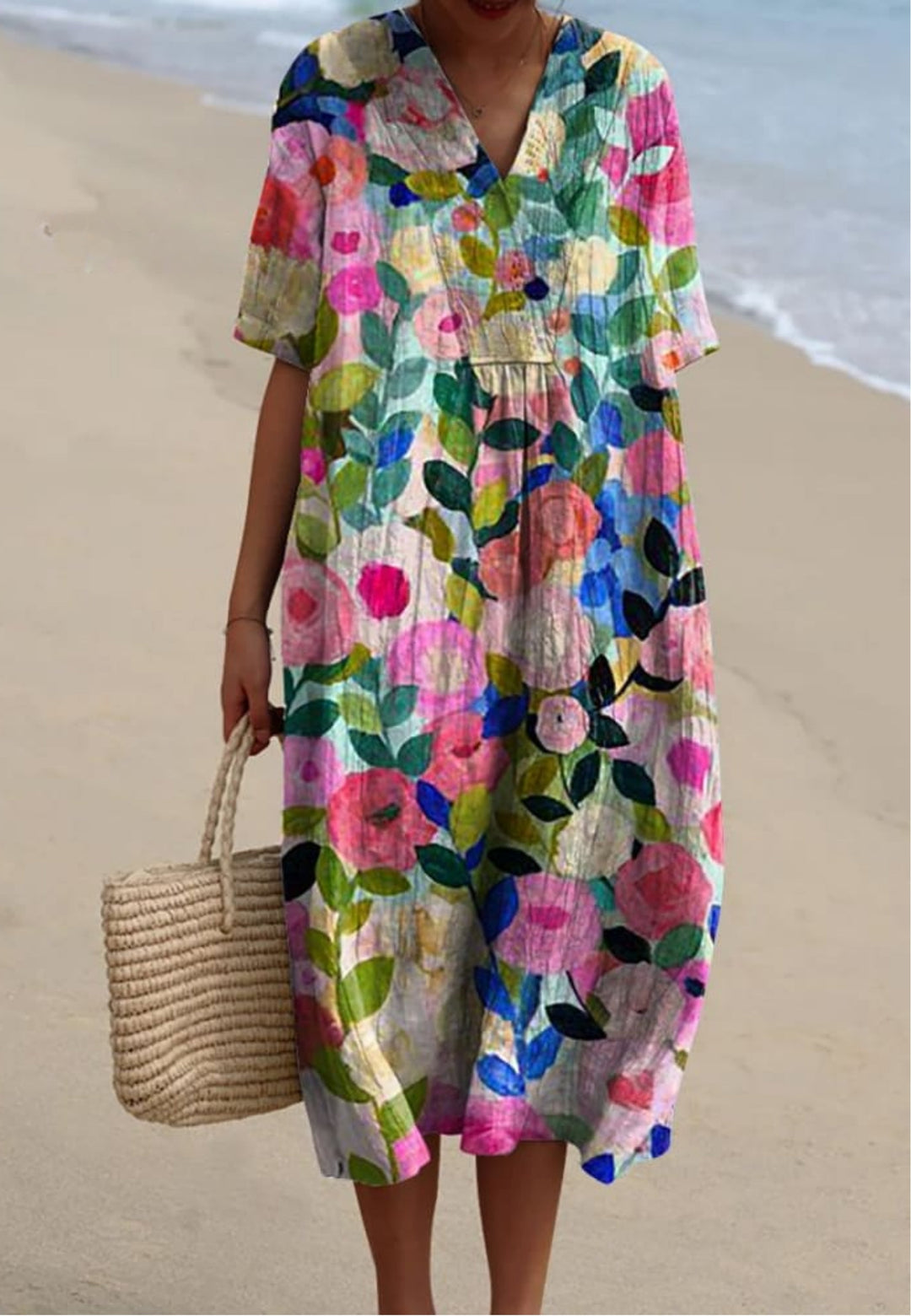 Vibrant women's floral garden print flowy midi dress, perfect for summer casual wear or a spring party.