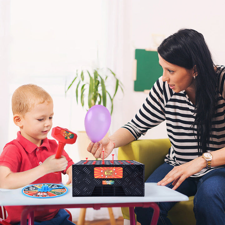 Components of the Wack-A-Balloon game: mallets, balloons, & game stand, family board game