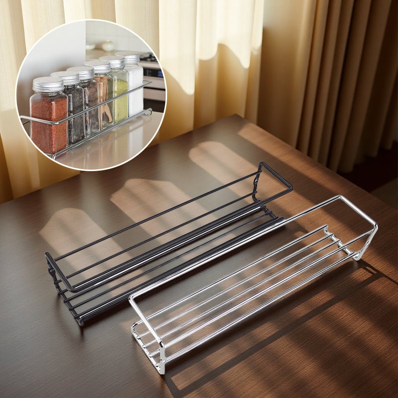 Empty black carbon steel spice rack, ready for installation in a kitchen for spice organization.