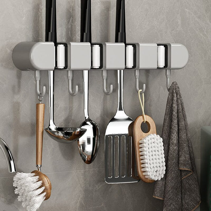 Heavy-duty cleaning tool holder for wall, ideal for broom closet, pantry or utility room storage