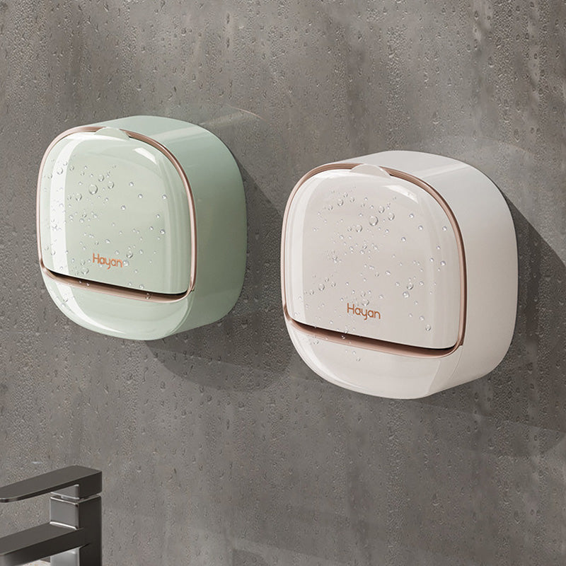 View of a bathroom wall with a functional self-draining soap dish, enhances bathroom storage and home decor.