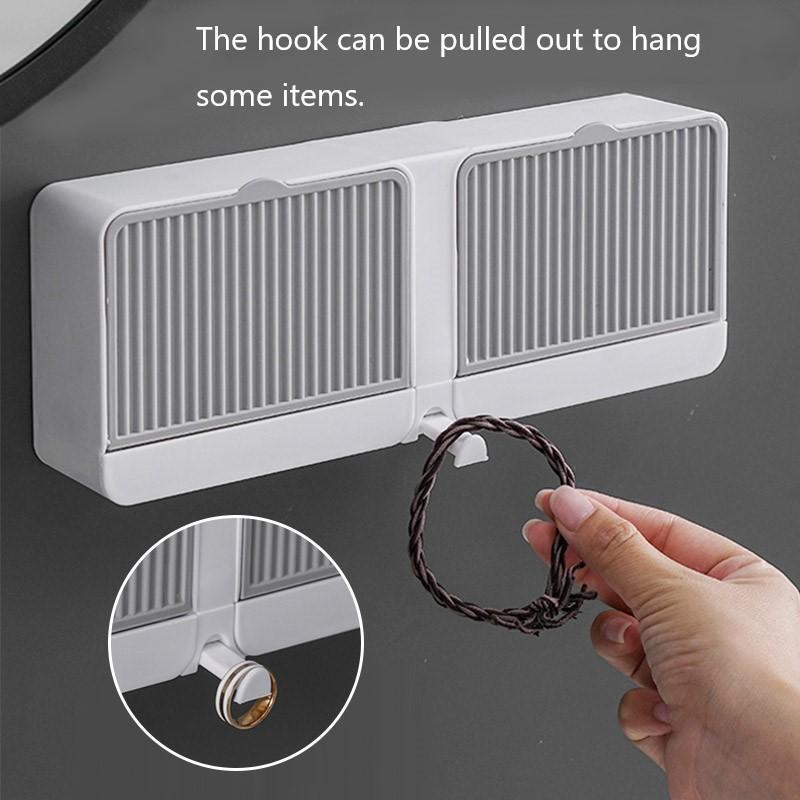 Kitchen sink soap holder, wall-mounted for space-saving, featuring a self-draining design to prevent sogginess.