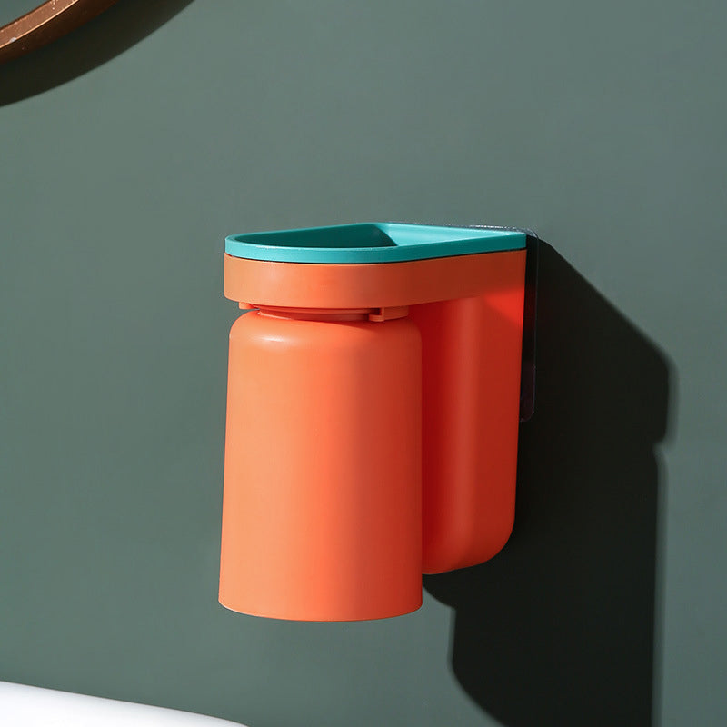 Functional wall-mounted dental care holder, keeping toothbrushes and cups tidy and accessible.