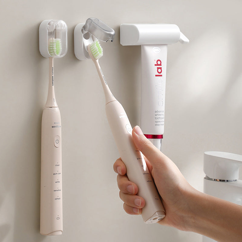 Installation view of adhesive backing for wall mounted toothbrush holder, no drilling