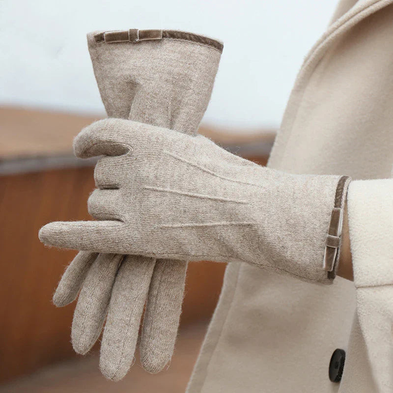 Warm women's cashmere blend touchscreen gloves in classic black, perfect for winter fashion.