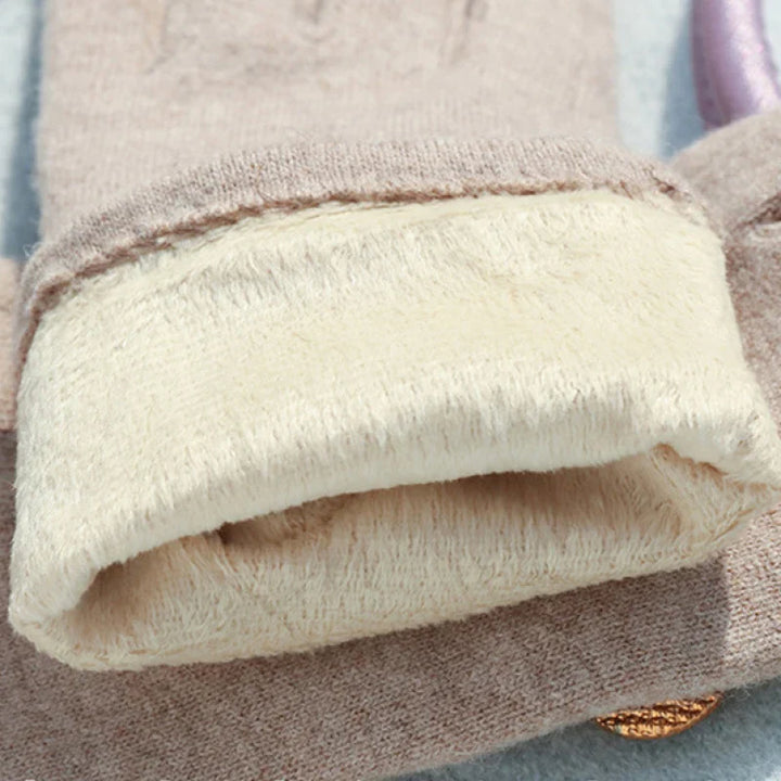 Pair of premium black cashmere blend touchscreen gloves for women, a must-have warm winter accessory.