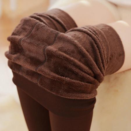Versatile black fleece leggings for women, perfect as a warm baselayer or for casual wear.